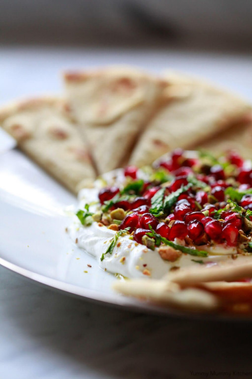 labne with pomegranate seeds and pita 